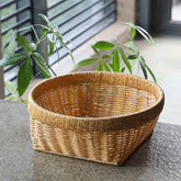 Small decorative basket available in three sizes, ideal for multipurpose storage in the kitchen, bedroom, or living room.